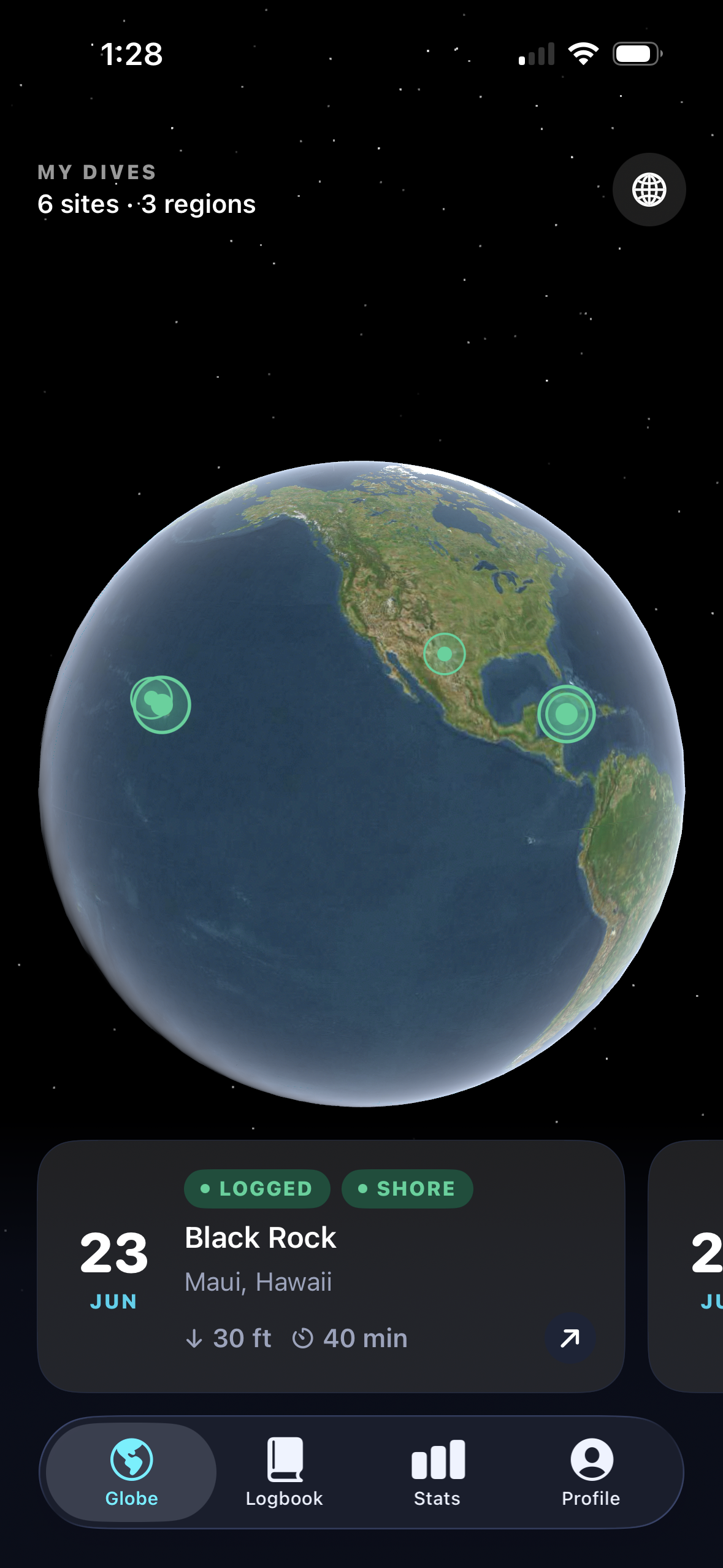 The Dyvo globe screen showing logged dive sites as pins across an interactive Earth, with a Black Rock, Maui dive card